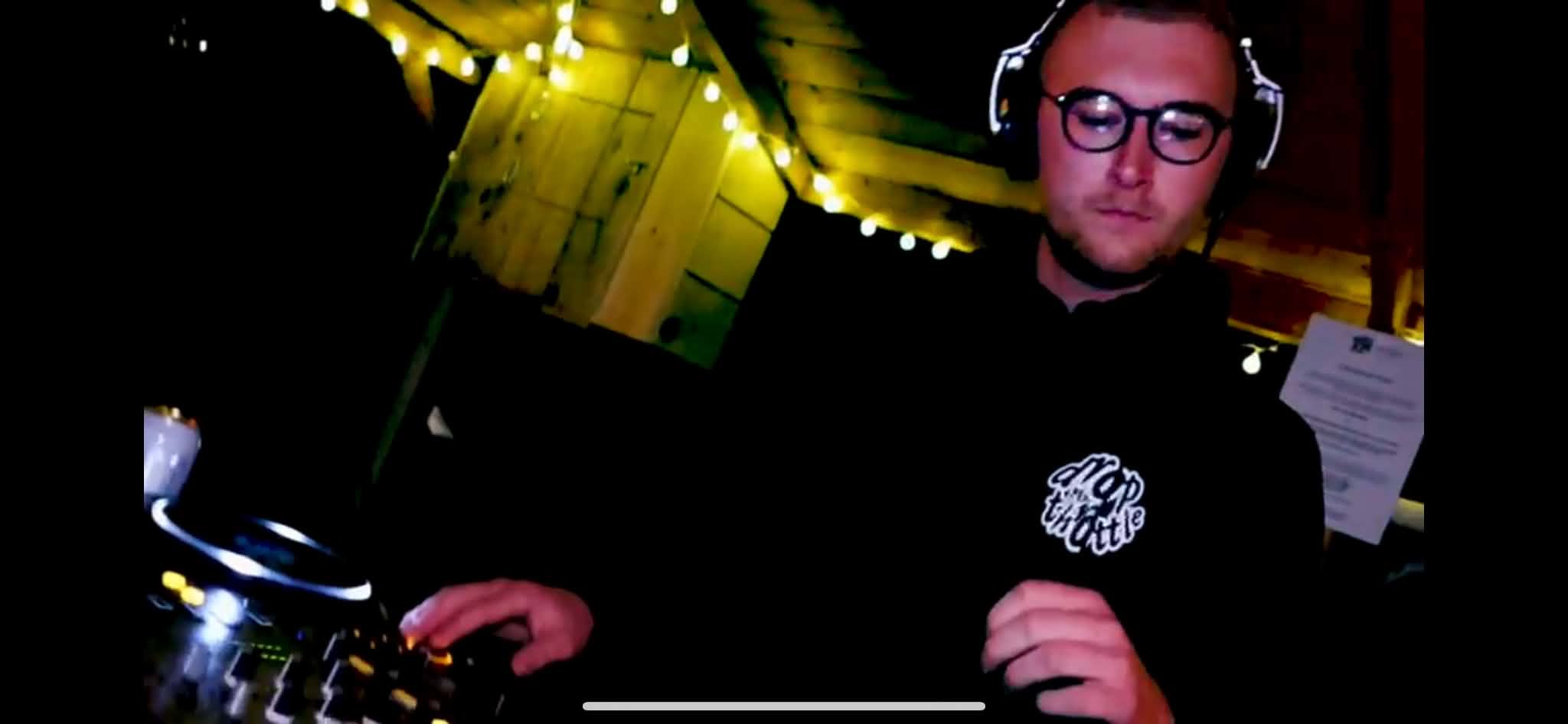 Danny Abbott performing in a club setting